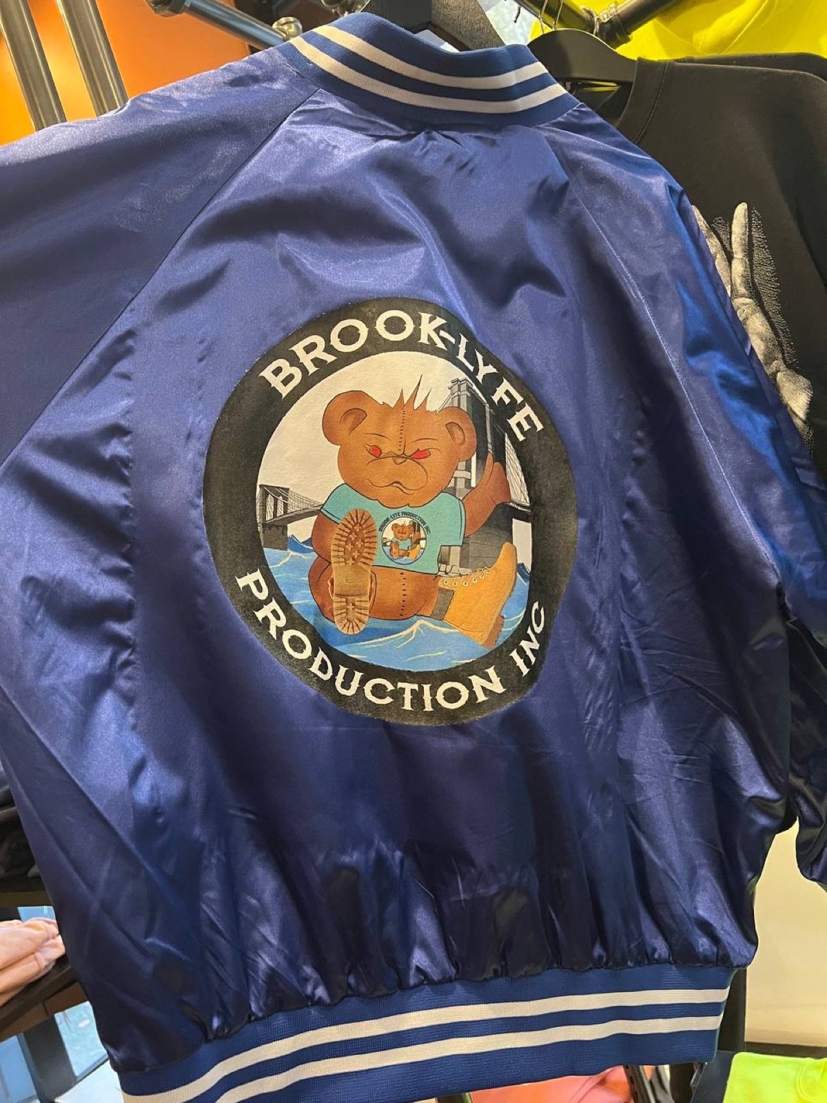 Large Brook-Lyfe back logo on blue jacket