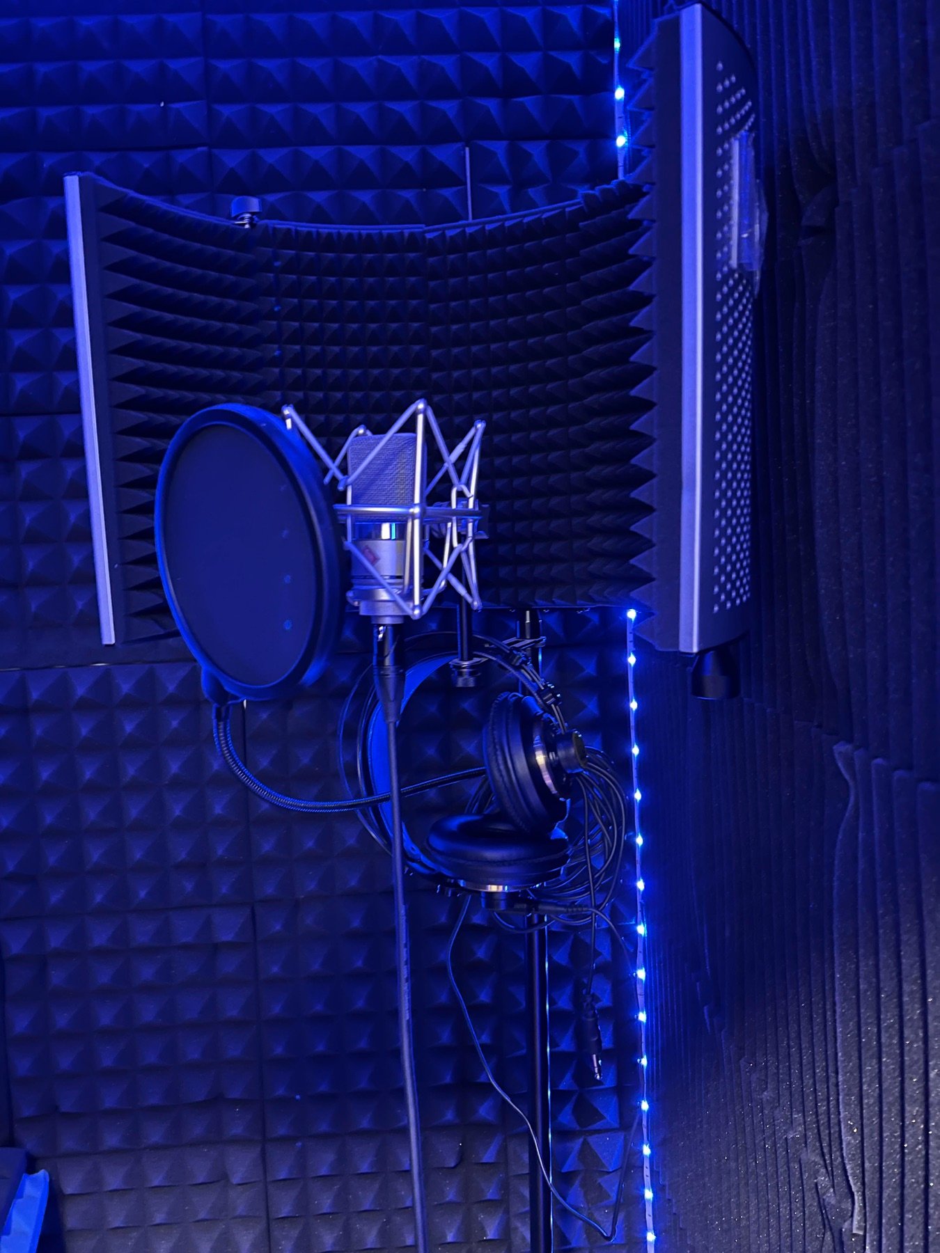 Brook-Lyfe vocal booth with microphone, pop filter, headphones, and acoustic treatment